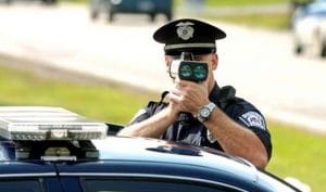 police officer with speed camera