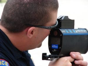 police officer with lidar gun
