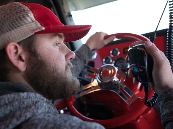 photo of a trucker using a police scanner