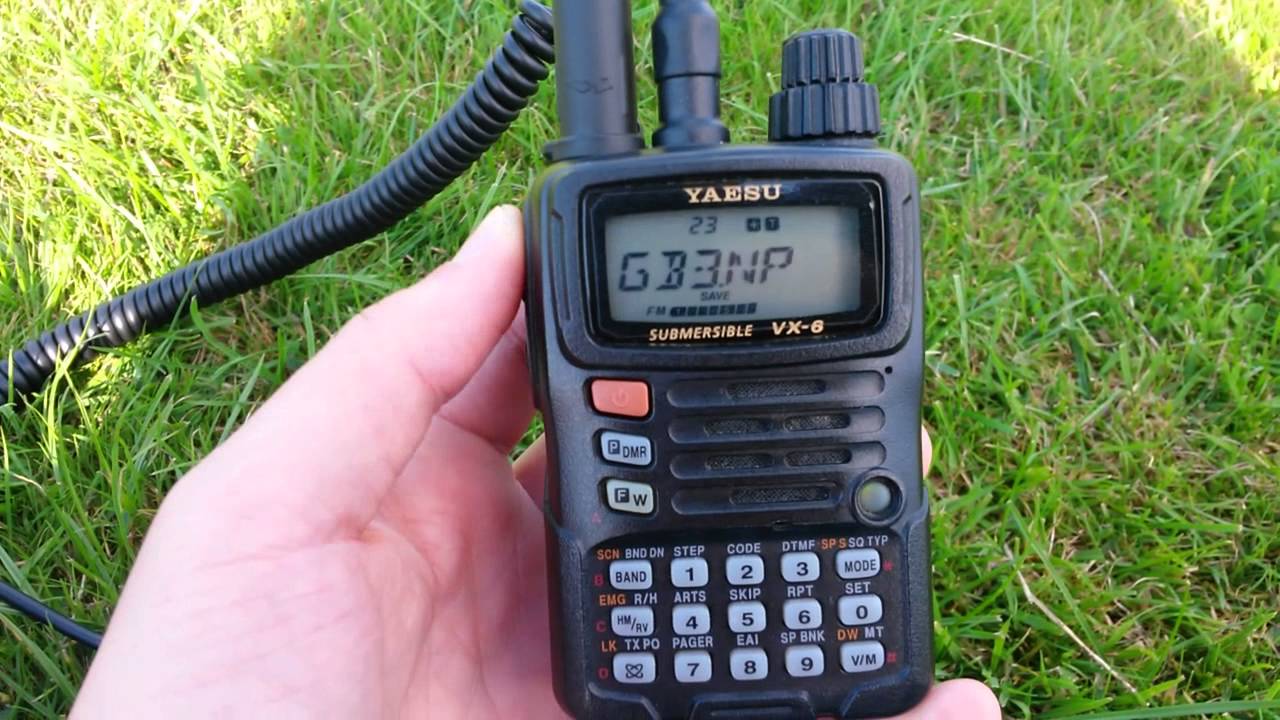 Yaesu VX-6R ham radio in hand