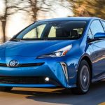A photo of a blue Toyota Prius car