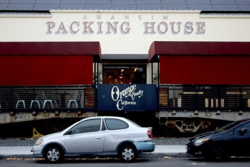 Cars parked in front of the Anaheim Packing House