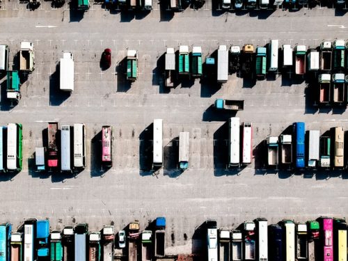 aerial shot of trucks lined up