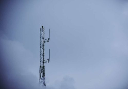 photo of tower with cloudy background