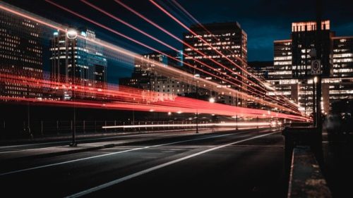 long exposure photo of road and cars at night