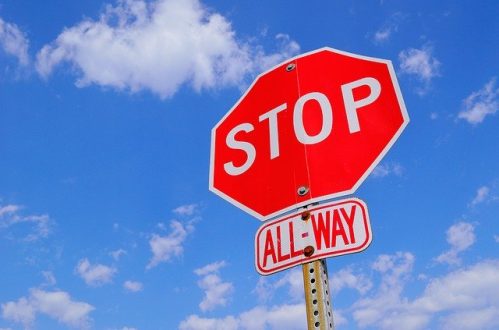 stop sign and blue sky