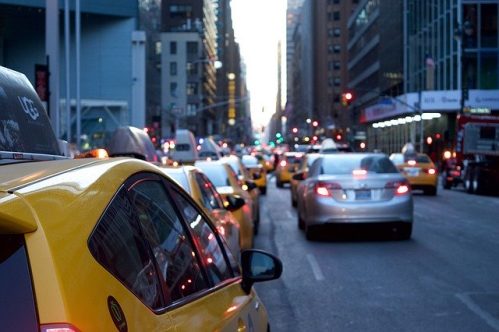 taxis and other vehicles on the road
