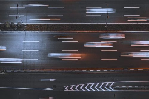 time lapse of cars on road