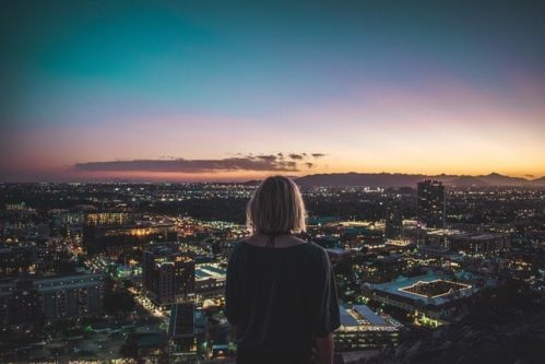 woman looking over the cityscape of Tempe